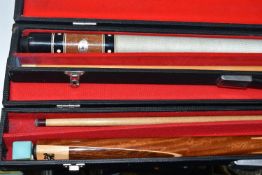 TWO CASED SNOOKER CUES, comprising a two section Ray Reardon cue in a ADAC case and an unbranded '