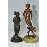 TWO SMALL BRONZE FIGURINES, comprising a twentieth century figure of a woman, mounted to an onyx