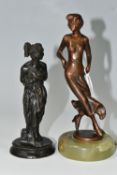 TWO SMALL BRONZE FIGURINES, comprising a twentieth century figure of a woman, mounted to an onyx