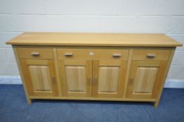 A G PLAN SOLID OAK SIDEBOARD, with three drawers, over four fielded panel doors, width 176cm x depth