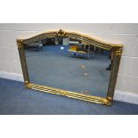 A DEKNUDT BELGIUM GILT OVERMANTEL MIRROR, with a mirrored frame and cartouche decoration, 128cm x