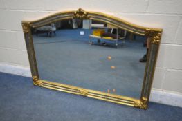 A DEKNUDT BELGIUM GILT OVERMANTEL MIRROR, with a mirrored frame and cartouche decoration, 128cm x