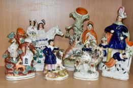 SEVEN NINETEENTH CENTURY STAFFORDSHIRE FIGURES AND FIGURE GROUPS, comprising three flatback spill
