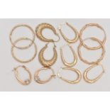 AN ASSORTMENT OF 9CT GOLD AND YELLOW METAL CREOLE AND HOOP EARRINGS, to include a pair of 9ct yellow