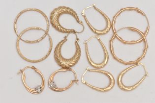 AN ASSORTMENT OF 9CT GOLD AND YELLOW METAL CREOLE AND HOOP EARRINGS, to include a pair of 9ct yellow
