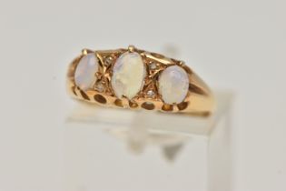 AN EARLY 20TH CENTURY 18CT GOLD OPAL RING, three oval opals prong set with four rose cut diamond