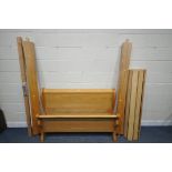 A LIGHT OAK 4FT6 BEDSTEAD, with side rails, slats and bolts (condition report: good)