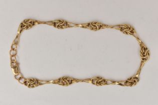 A 9CT GOLD FANCY LINK BRACELET, yellow gold knot link chain bracelet, fitted with a lobster clasp,