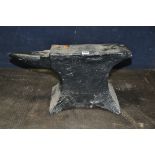 A VERY HEAVY CAST METAL ANVIL, length 57cm x depth 13cm x height 30cm, with a bespoke made stand