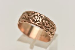 A 9CT GOLD BAND RING, wide rose gold band, etched with foliage detail, approximate width 7.5mm,