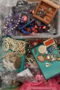 A BOX OF ASSORTED COSTUME JEWELLERY, to include a selection of brooches, beaded necklaces, fashion