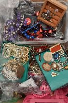 A BOX OF ASSORTED COSTUME JEWELLERY, to include a selection of brooches, beaded necklaces, fashion