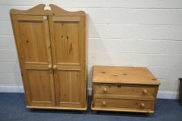 A MODERN PINE TWO DOOR WARDROBE, width 84cm x depth 54cm x height 182cm, and a matching chest of