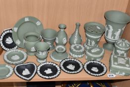 TWENTY ONE PIECES OF WEDGWOOD JASPERWARES, mainly sage green, with five black pin dishes, to include