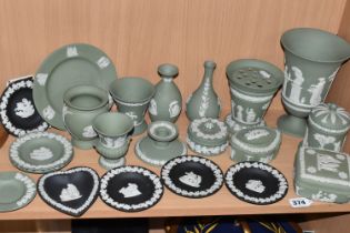 TWENTY ONE PIECES OF WEDGWOOD JASPERWARES, mainly sage green, with five black pin dishes, to include