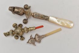 THREE CHILDRENS RATTLES, the first a white metal rattle with whistle, fitted with a suspension ring,