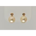 A PAIR OF IMITATION PEARL AND DIAMOND EARRINGS, each designed as a brilliant cut diamond above an