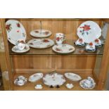 A GROUP OF ROYAL ALBERT TEAWARE, comprising 'poinsettia' pattern two tier cake stand, dinner