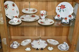 A GROUP OF ROYAL ALBERT TEAWARE, comprising 'poinsettia' pattern two tier cake stand, dinner
