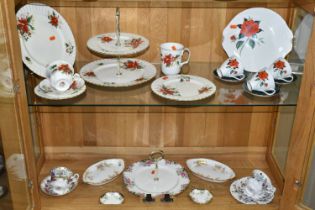 A GROUP OF ROYAL ALBERT TEAWARE, comprising 'poinsettia' pattern two tier cake stand, dinner