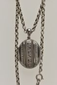 A VICTORIAN SILVER LOCKET AND BELCHER CHAIN, oval locket with etched foliage detail with banded