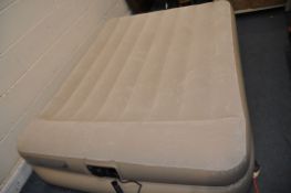 AN INTEX AIRBED WITH BUILT IN PUMP width 152cm x depth 203cm x height 47cm (PAT pass and working)