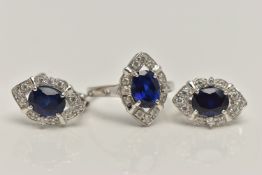 A WHITE METAL RING AND EARRINGS, the ring of a marquise shape, set with an oval cut synthetic blue