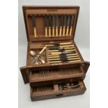 A LARGE WOODEN CANTEEN, box signed 'Evans & Matthews', incomplete ivorine handled cutlery set