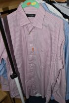 A GROUP OF GENTLEMEN'S CHRISTIAN DIOR CLOTHING, to include one pink striped and one blue striped
