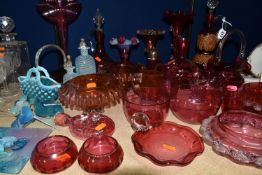 A COLLECTION OF CRANBERRY GLASSWARE, comprising a Bohemian crystal decanter decorated with