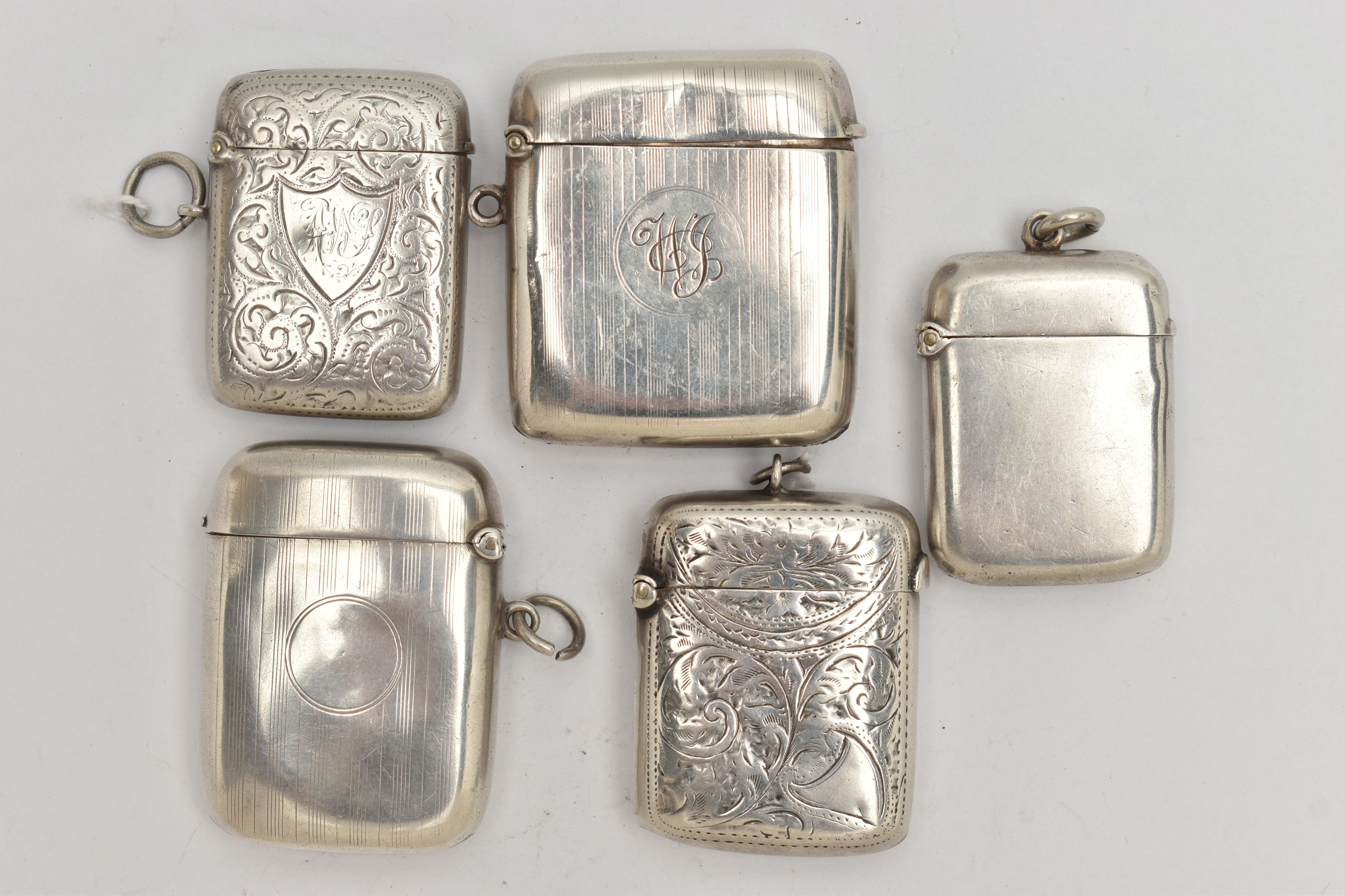 FIVE SILVER VESTA CASES, each of a rectangular form, one polished, two with an engine turned pattern