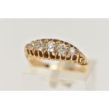 A EARLY 20TH CENTURY FIVE STONE DIAMOND BOAT RING, five old cut diamonds, prong set in yellow metal,