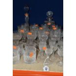 A SUITE OF THOMAS WEBB CUT CRYSTAL 'NORMANDY' PATTERN GLASSES AND DECANTERS, comprising a red wine