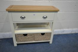 A MODERN PAINTED AND OAK SIDE TABLE, with a single long drawer, and two wicker baskets, width 82cm x