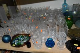 A QUANTITY OF DRINKING GLASSES, BOWLS AND VASES, some items of coloured glass including a small blue