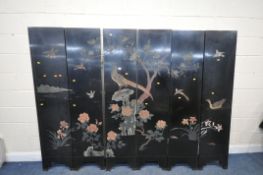 A BLACK LAQUERED ORIENTAL SIX FOLDING SCREEN, each side showing a different chinoiserie image,