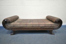 A REGENCY MAHOGANY DAY BED, with scrolled ends, reeded detail, on splayed legs, length 205cm (