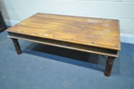A MANGOWOOD AND IRON COFFEE TABLE, length 135cm x depth 75cm x height 40cm (condition report: