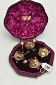 A MAPPIN & WEBB CASED SET OF FOUR VICTORIAN SILVER SALTS AND SPOONS, the open salts with wavy