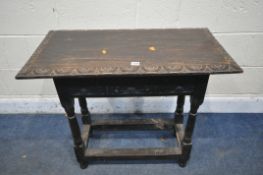A GEORGIAN CARVED OAK RECTANGULAR TABLE, with a lunette carved frieze, united by a box stretcher,