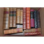 ONE BOX OF 13 LEATHER-BOUND BOOKS comprising Debrett's Genealogical Peerage of Great Britain and