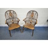 A PAIR EARLY 20TH CENTURY ELM AND BEECH WINDSOR ARMCHAIRS, the spindled hoop back with a wheel