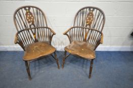 A PAIR EARLY 20TH CENTURY ELM AND BEECH WINDSOR ARMCHAIRS, the spindled hoop back with a wheel