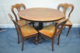A VICTORIAN MAHOGANY OVAL TILT TOP LOO TABLE, with turned support, on three legs with leaf detail,
