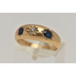 A LATE VICTORIAN 18CT GOLD DIAMOND AND SAPPHIRE RING, centre with a star set old cut diamond,