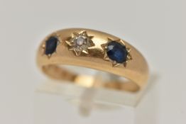 A LATE VICTORIAN 18CT GOLD DIAMOND AND SAPPHIRE RING, centre with a star set old cut diamond,