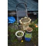 A GARDEN URN, with foliate and leaf detail, diameter 50cm x height 45cm, four small, glazed pots,