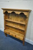 A PINE WALL MOUNTED PLATE RACK, with three drawers, width 87cm x depth 18cm x height 112cm (