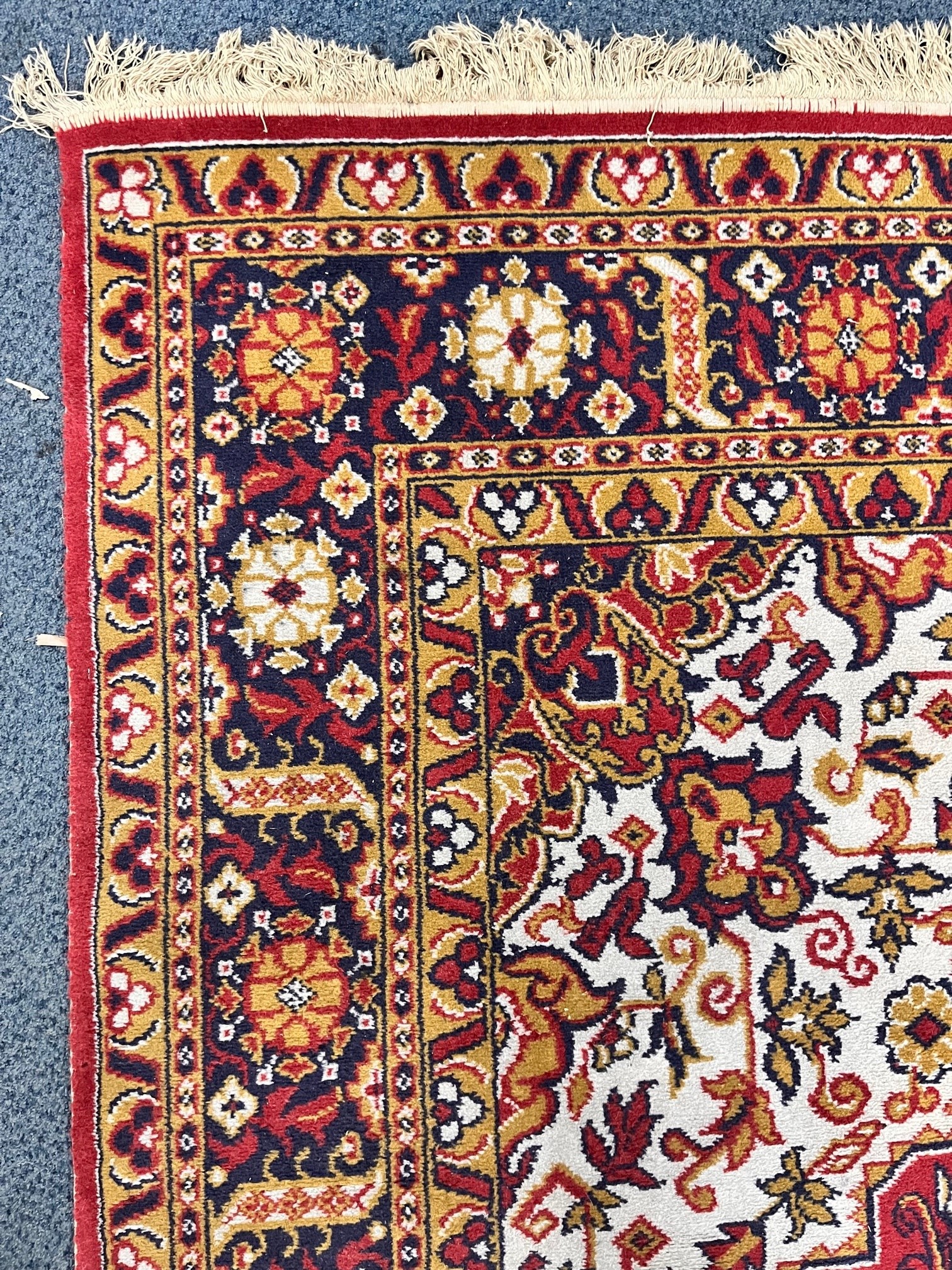 A LARGE WOOLLEN PERSIAN FLORAL PATTERNED RUG, with a red and cream field, 360cm x 250cm (condition - Image 2 of 3