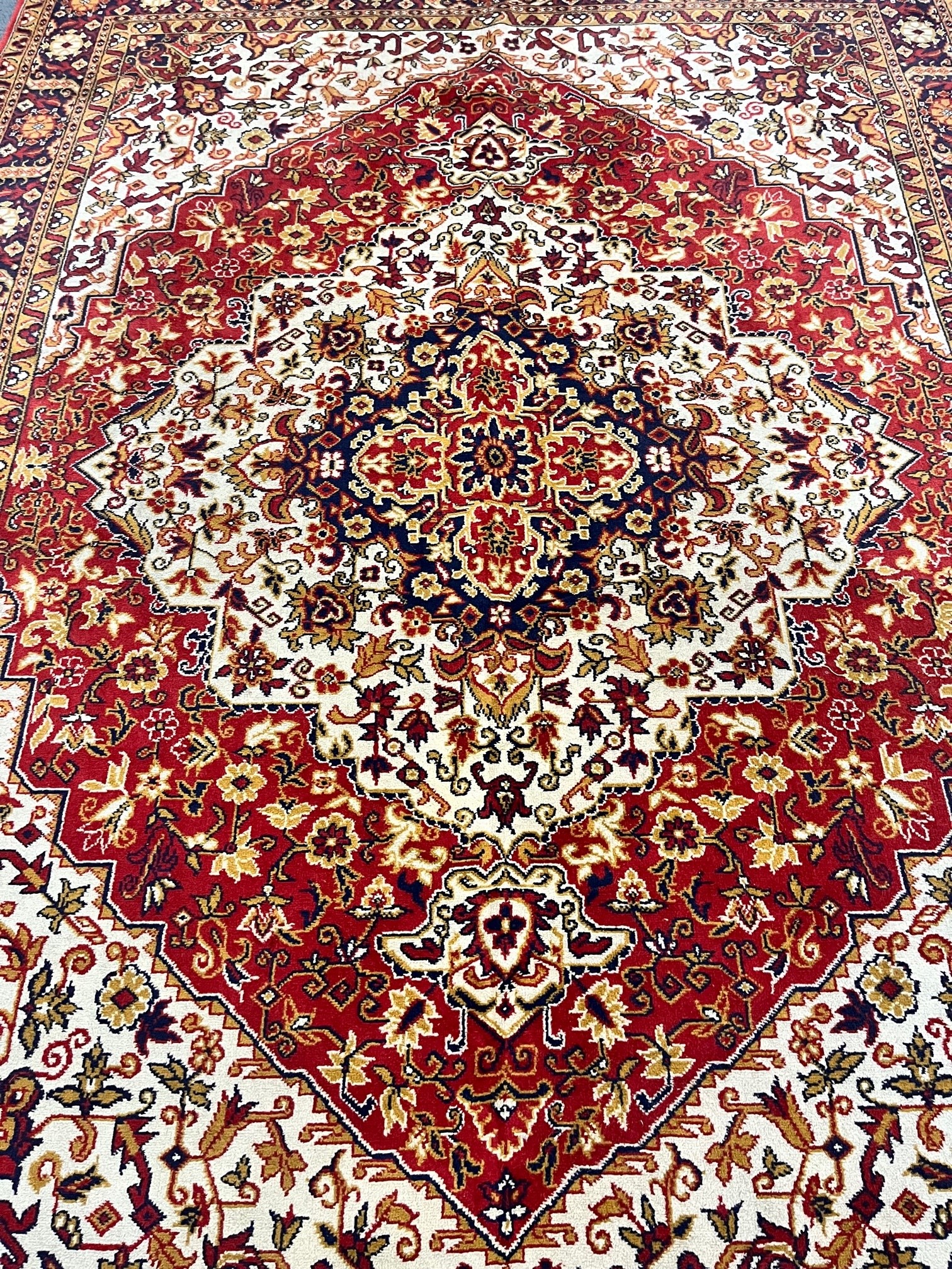 A LARGE WOOLLEN PERSIAN FLORAL PATTERNED RUG, with a red and cream field, 360cm x 250cm (condition - Image 3 of 3